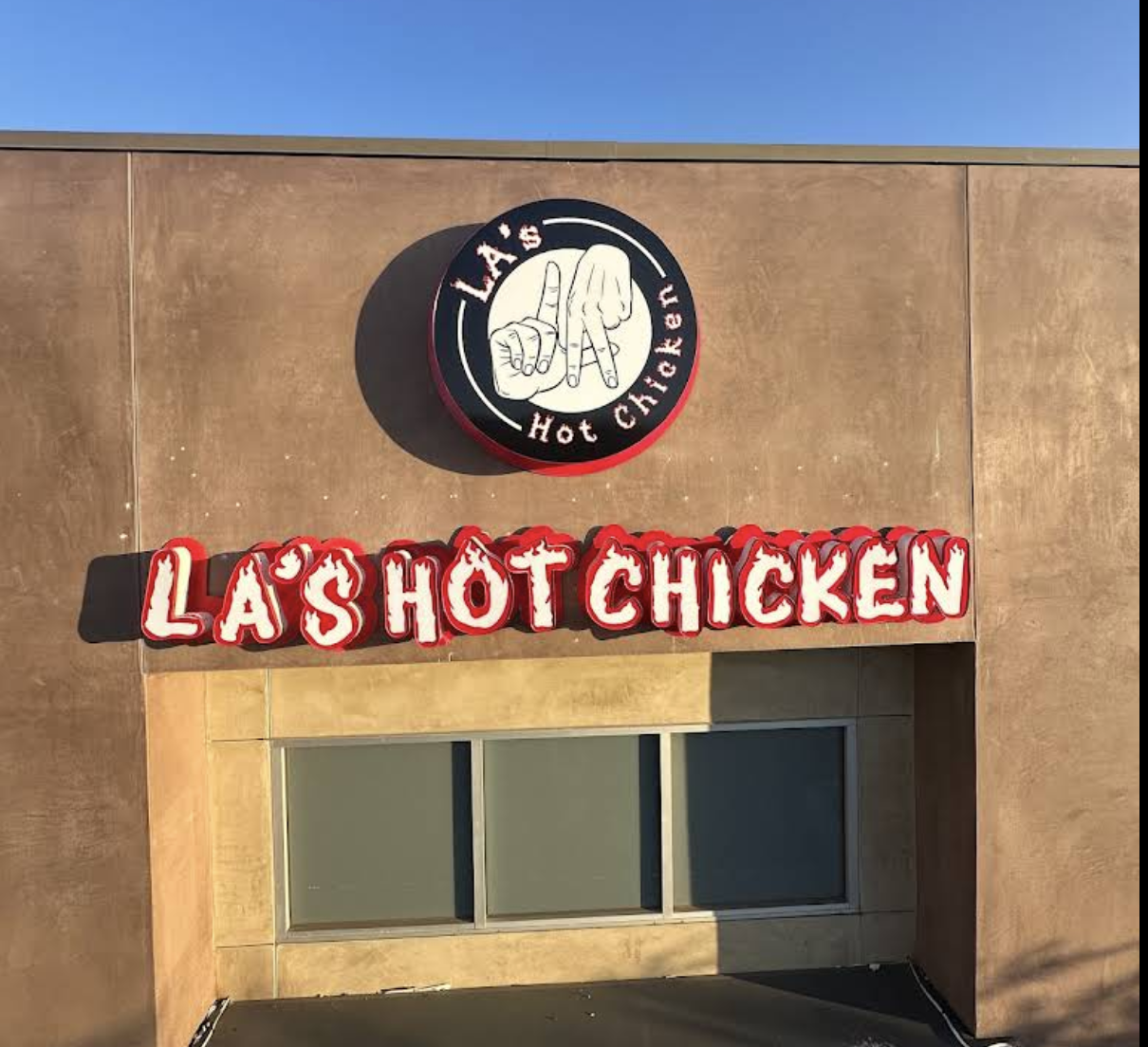 LA's Hot Chicken illuminated halo-lit channel letters at night